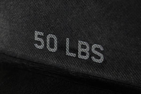 The Heavyweight Case — Clash Royale Black background with "50 LBS" in grey type