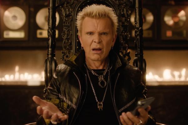 Trolled by Rock N' Roll — Workday Billy Idol sitting on a throne with a line of flames in the background