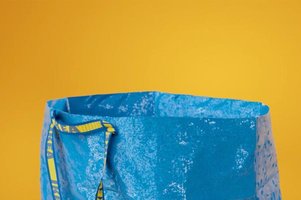 Como Tú le Digas, lo Tenemos / Whatever You Call it, We Have It — IKEA IKEA blue bag against a yellow background