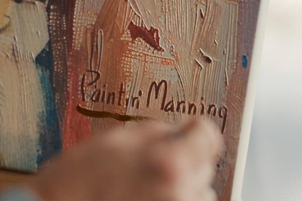 Image of child's painting that says "Paintin' Manning"