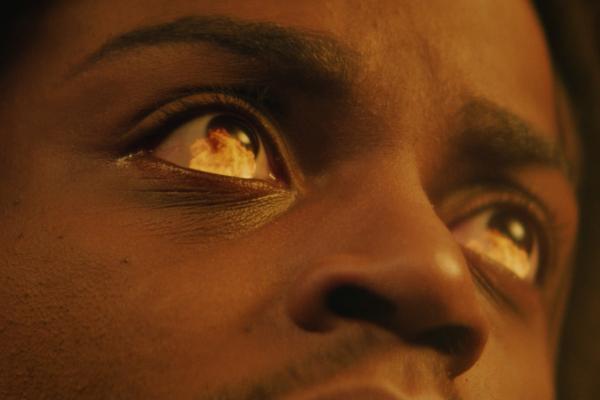 The Royalse Curse —Clash Royale Close up on a face, in the reflection of the eyes we see flames